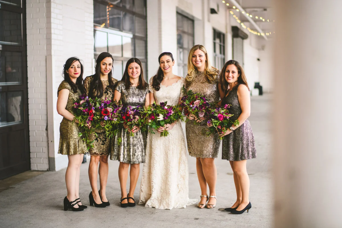 Bride and bridesmaids in gold dresses at Dock 5 at Union Market, DC, Planning by Bella Notte, Photo by Sam Hurd