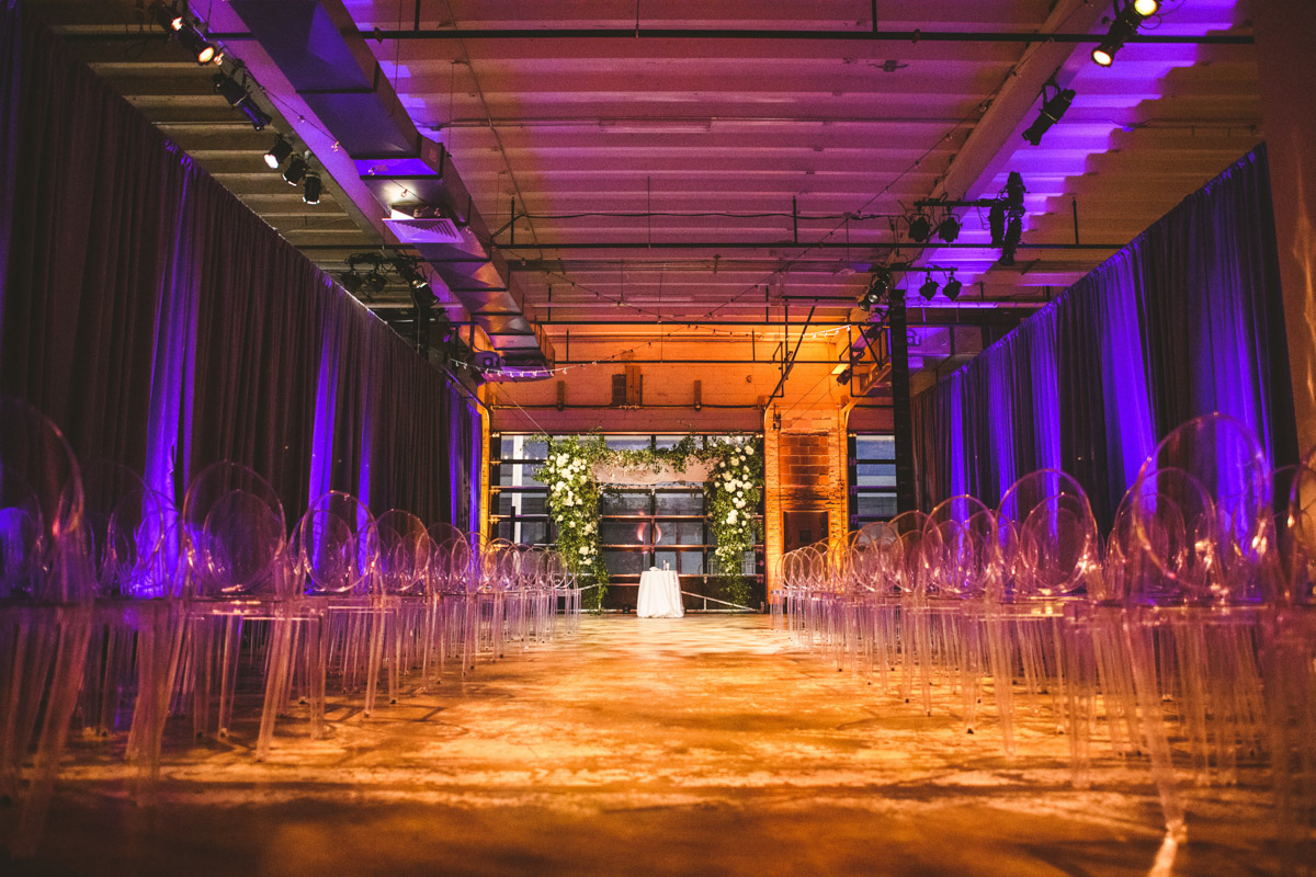 Modern wedding ceremony decor with ghost chairs at Dock 5 at Union Market, DC, Planning by Bella Notte, Photo by Sam Hurd