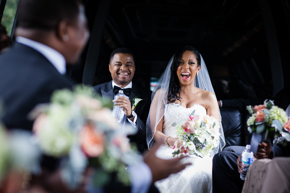 Gorgeous bride and groom in a limo with their wedding party, heading for the Mellon Auditorium in DC, Planning by Bella Notte, Photo by The Observatory
