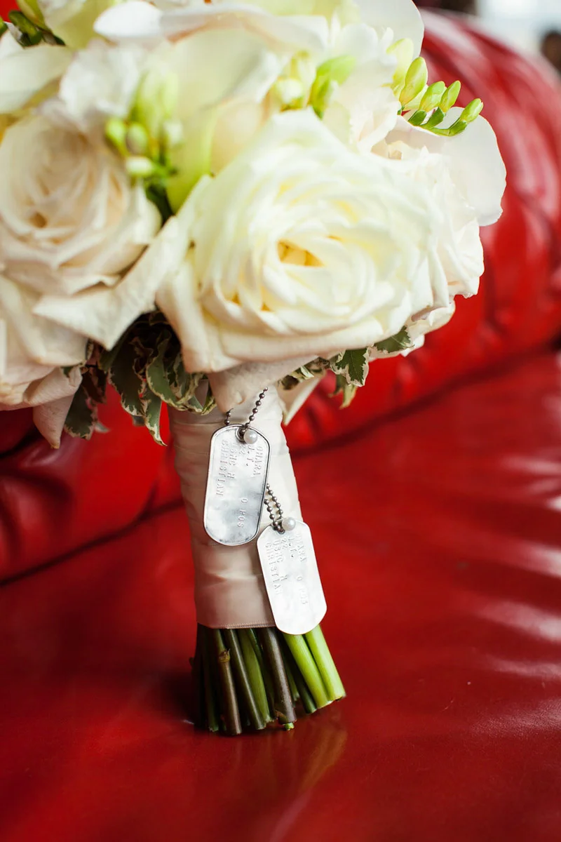 White rose wedding bouquet wrapped with dog tags, Wedding planning by Bella Notte, Photo by The Observatory