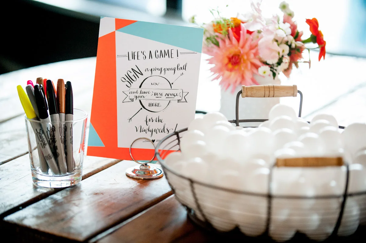 Beer pong at colorful Dock 5 at Union Market wedding reception, planning by Bella Notte, Photo by Andrew Harnik
