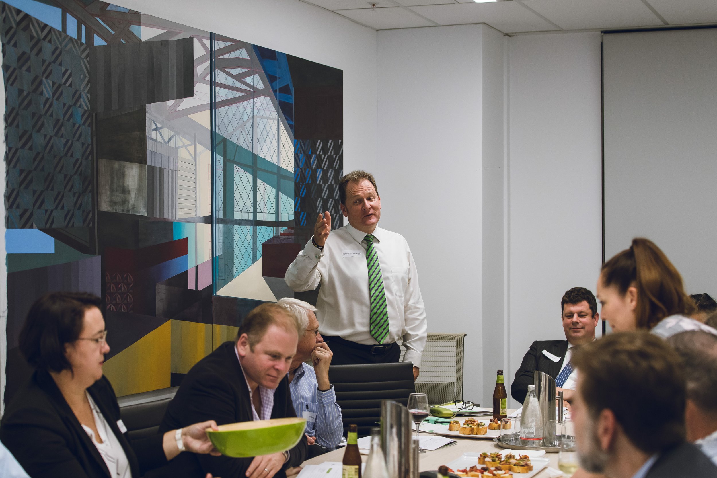 Ken speaking in boardroom.jpg