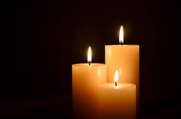 candles-in-the-dark-picture-id157697273.jpg