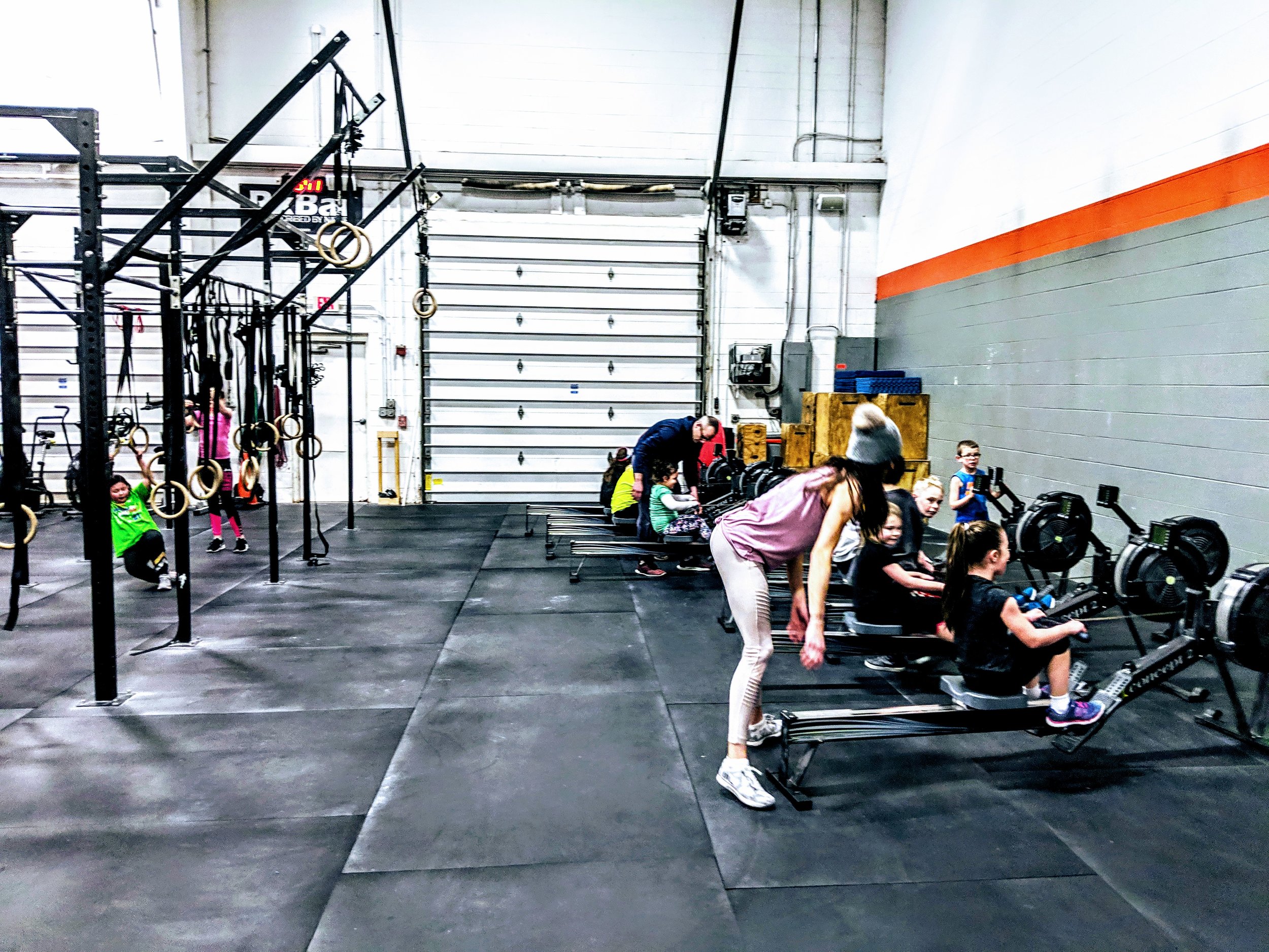 Trying out the rowers at CrossFit Enclave