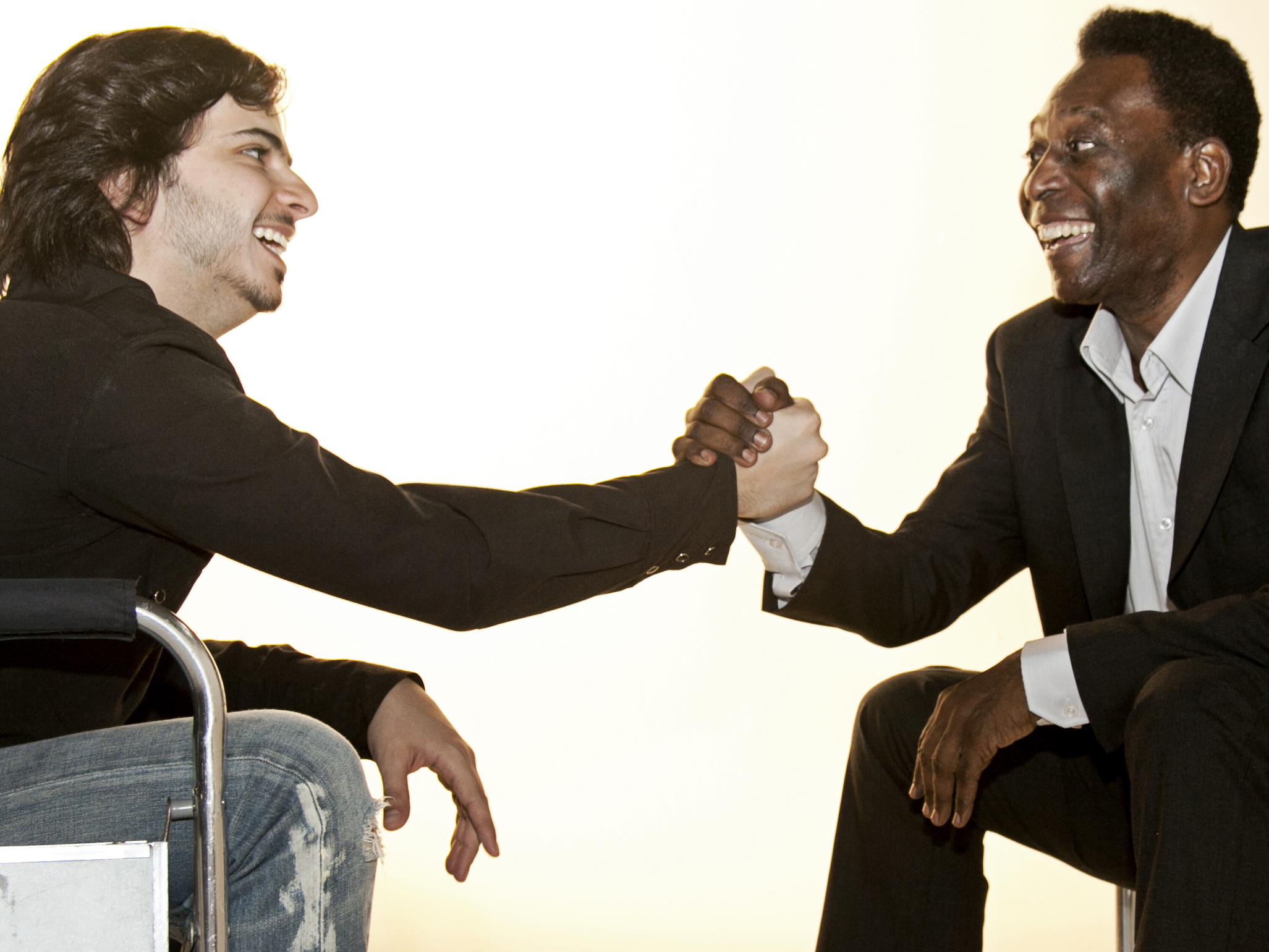 Shaking hands with the owner of the most famous feet in football history after shooting a campaign.