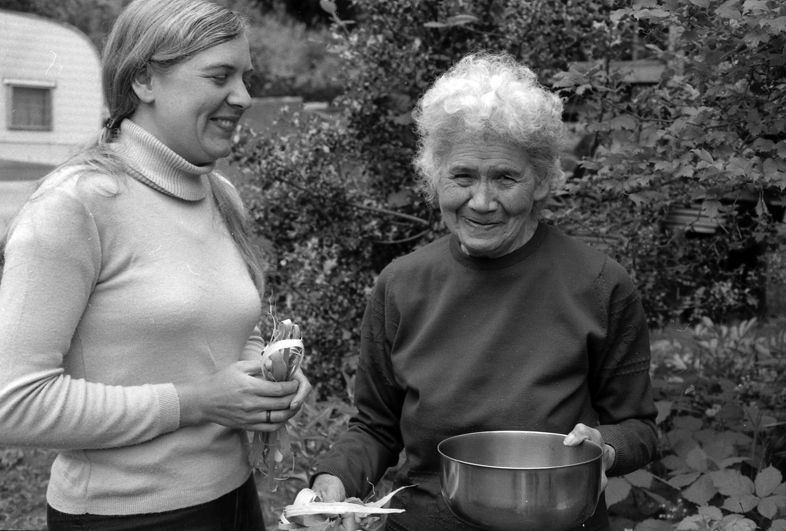 Nlaka’pamux elder Annie York, holding a bowl of soapberries, shows Nancy Turner how to make a soapberry whip from maple, early 1970s | Nancy Turner / Hakai Magazine