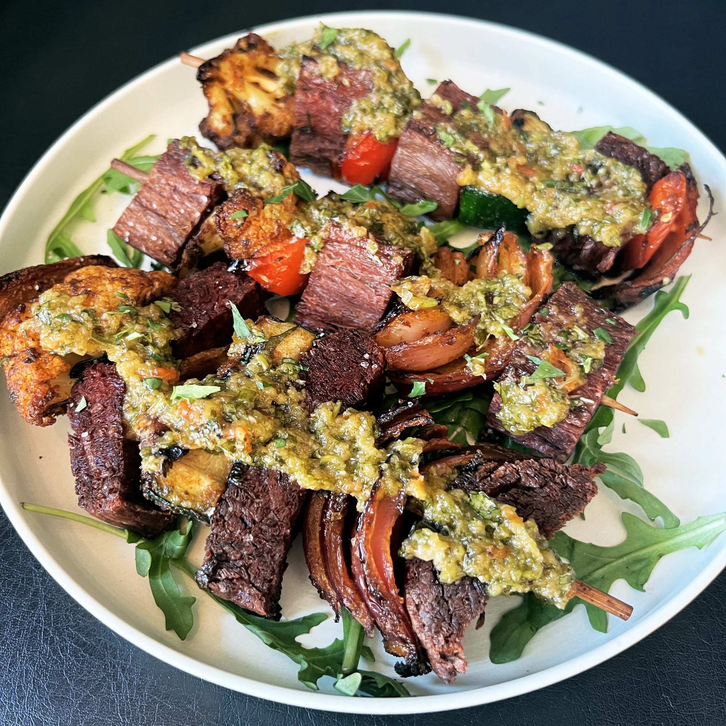 Street Stylee Skewers with grilled chunk steak, grilled vegetables, and chimichurri sauce at Urban Vegan Kitchen in Chelsea, NYC