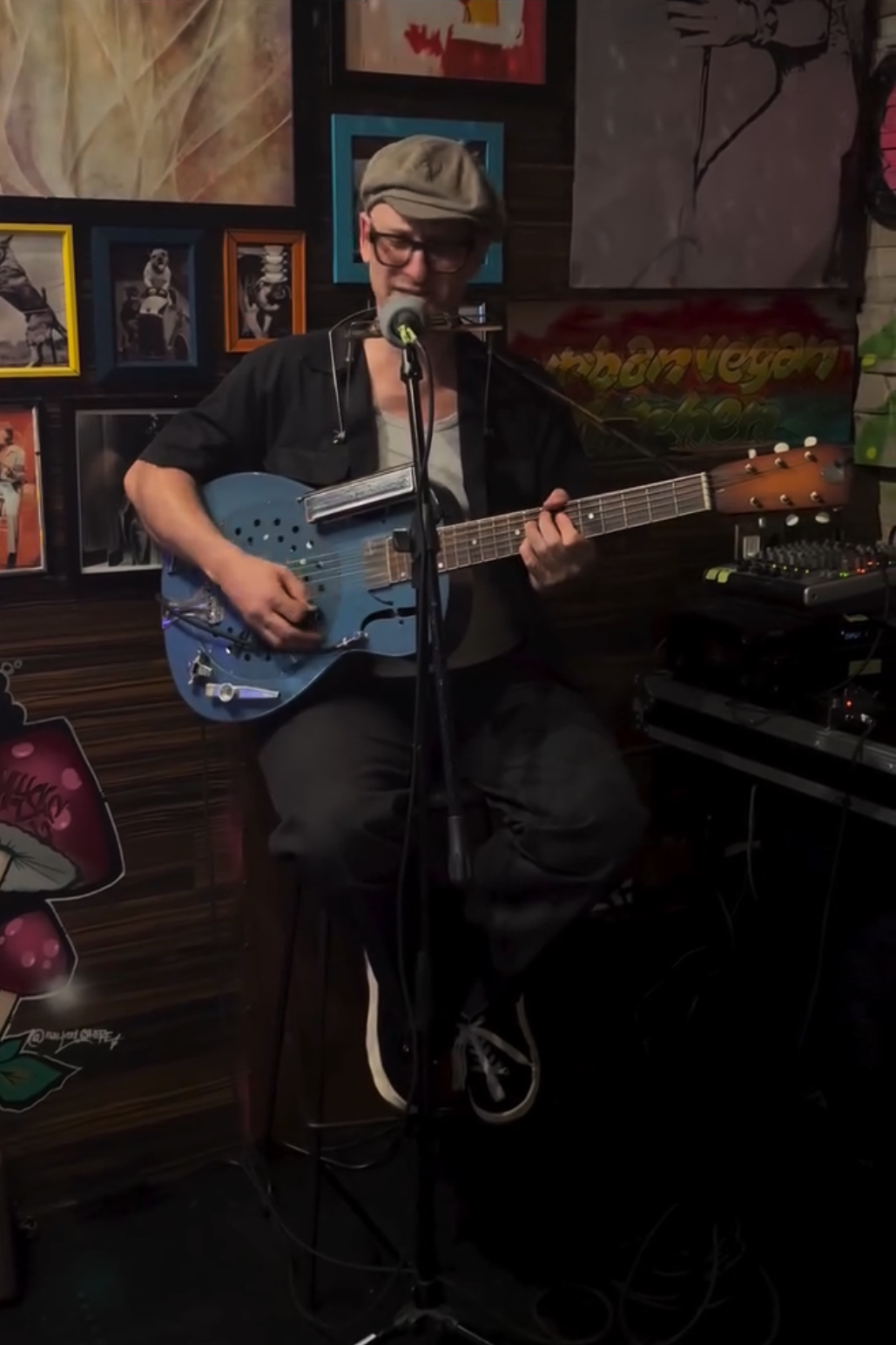 Marcus Milius performing live blues music at Urban Vegan Kitchen in Chelsea, NYC.