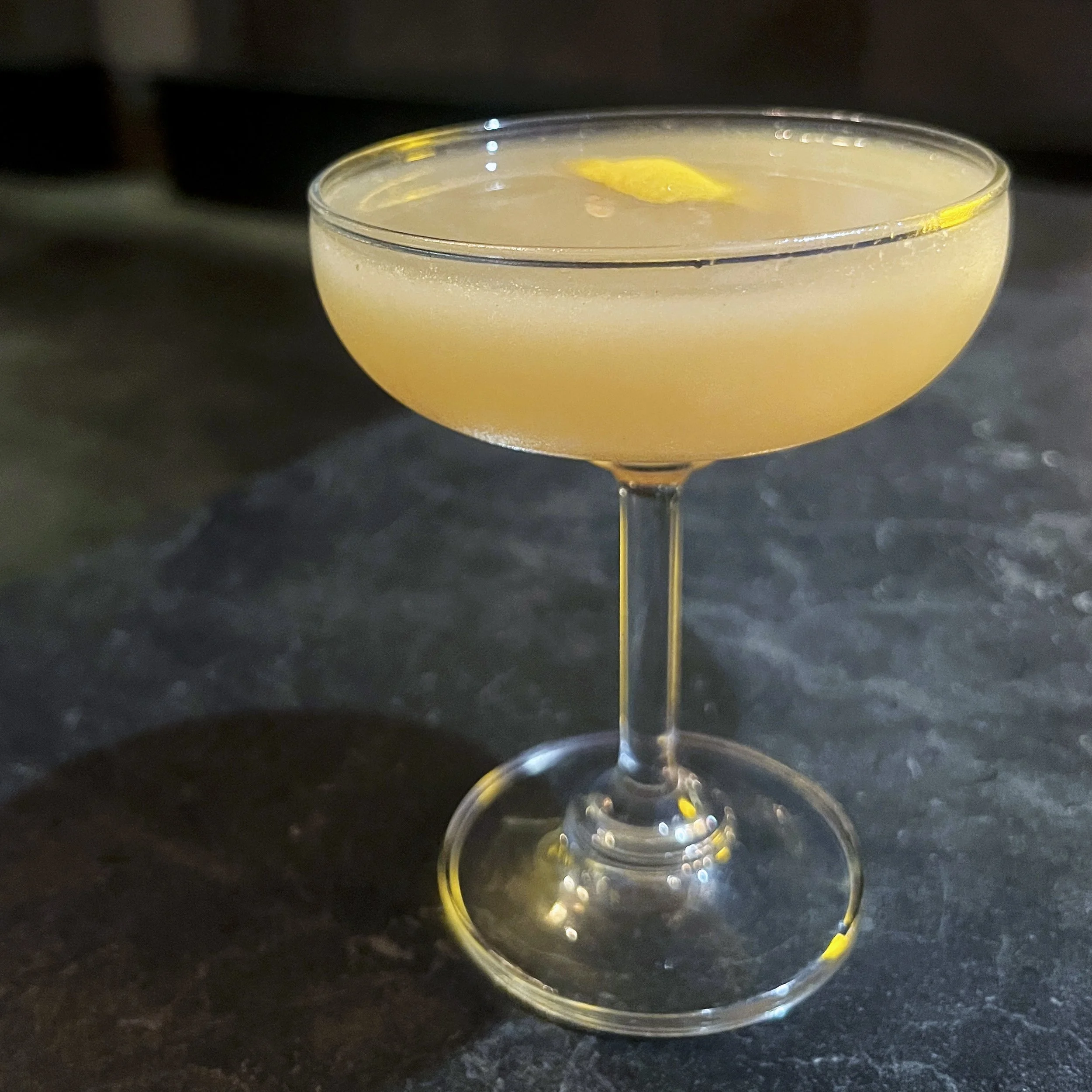 So Fresh, So Clean mocktail with housemade Trust Your Gut herbal tincture, verjus, and lemon brine at Urban Vegan Kitchen.