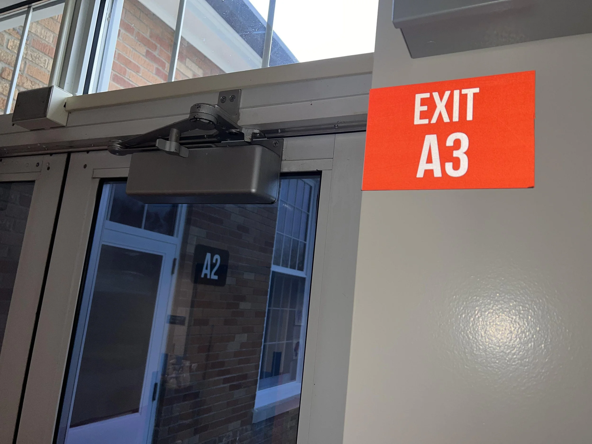 school safety exit door number placard interior