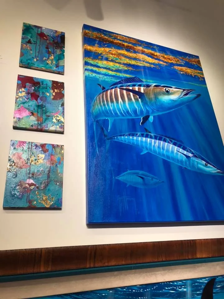 Small Untitled works next to Jamaican marine wildlife artist and conservationist, Guy Harvey.