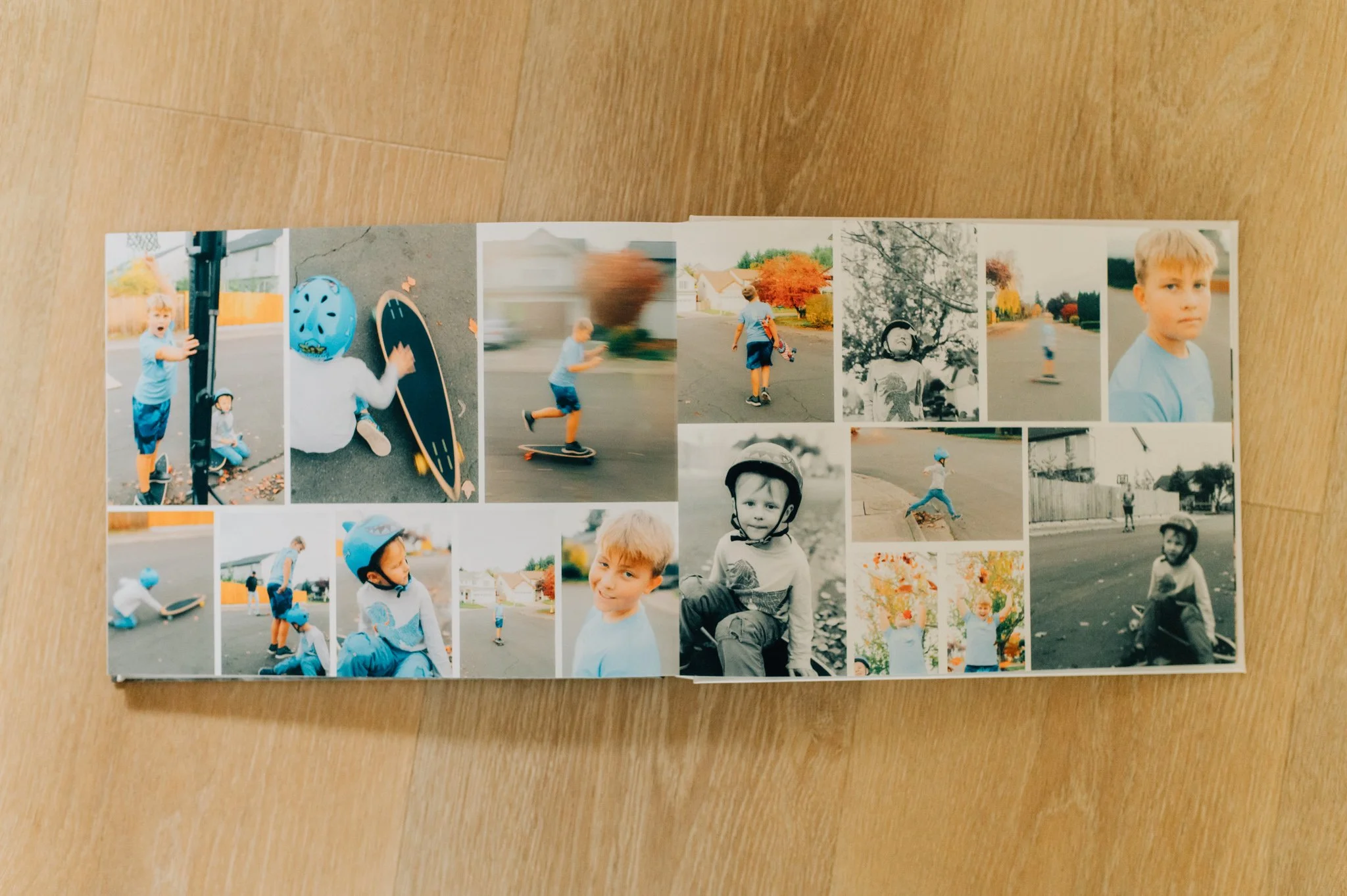 photo book open to page featuring multiple photos of two boys skateboarding