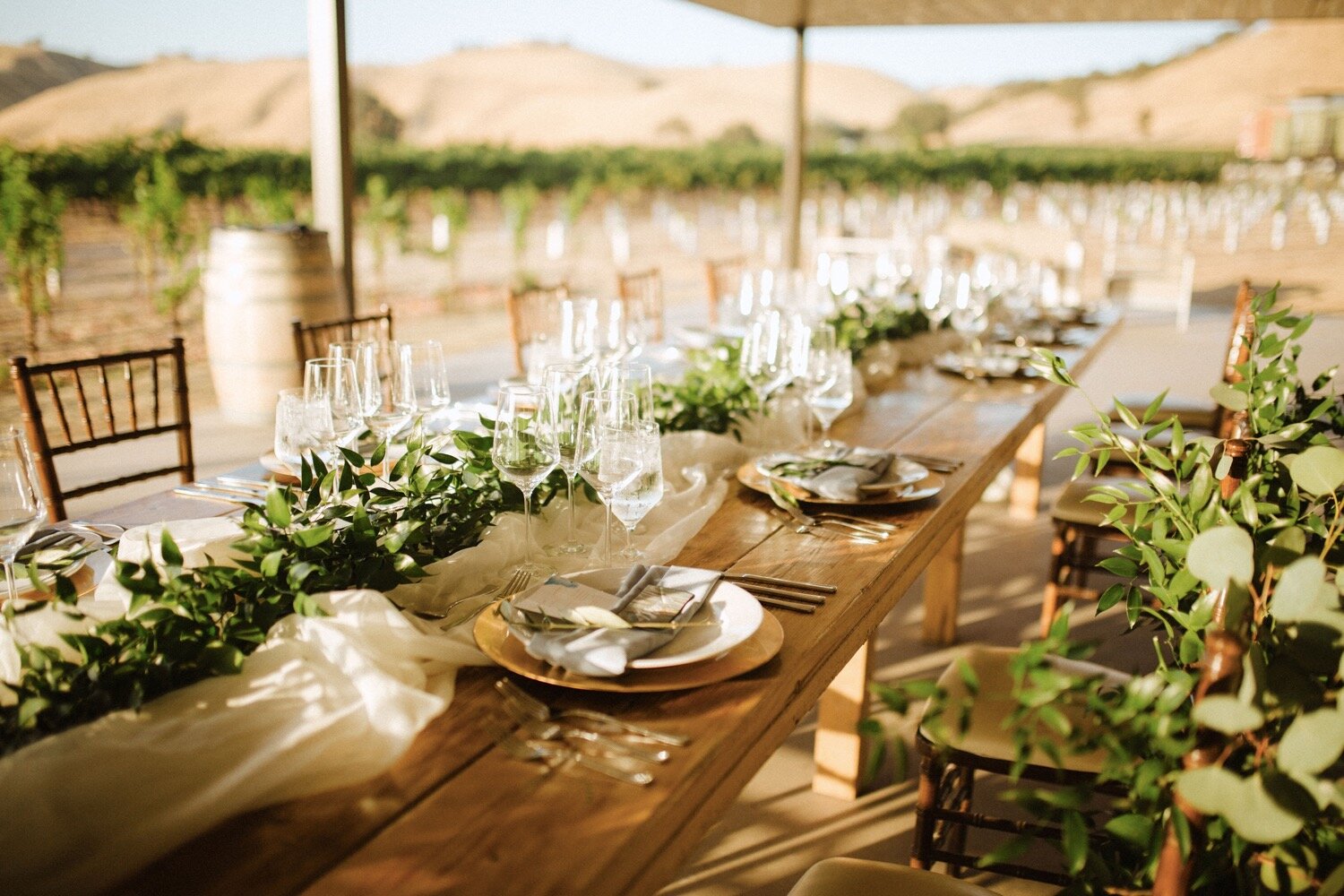 Rustic vineyard farmhouse table settings at Cass Winery wedding. SLO Wedding Photographers