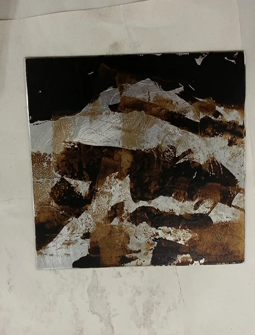 Using ground as stop out and putting plate into acid for an 'open bite' etch.