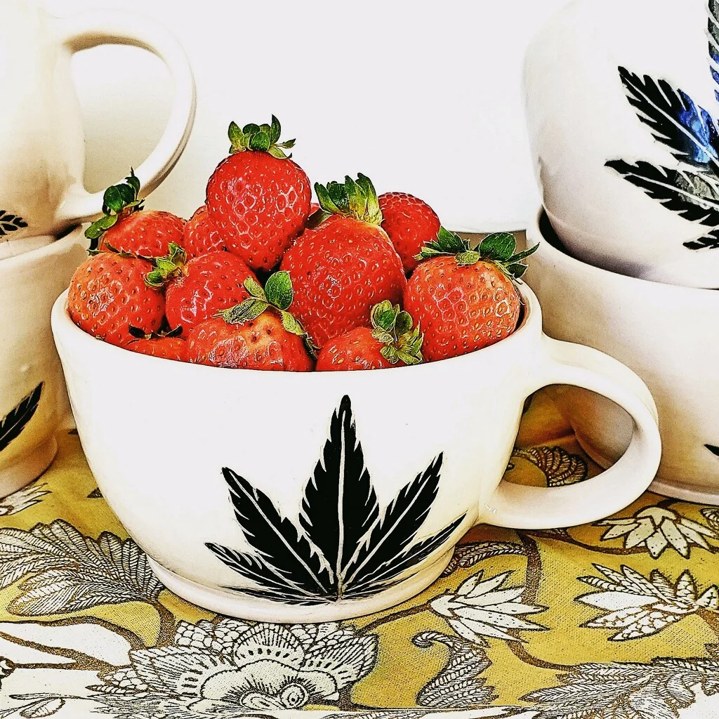 The KopSun mugs are handcrafted by Deb Jorgensen..