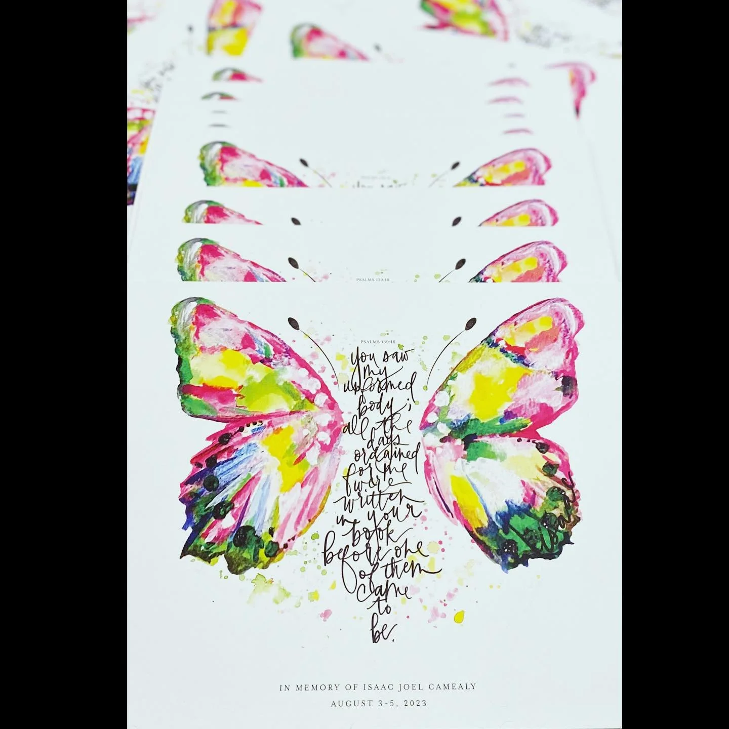 Psalms 139:16 butterfly prints getting packaged up pretty for the Isaac Camealy Memorial Birthday Bash TOMORROW! The butterfly was painted with love in the colors of Trisomy 13 Awareness ❤️ (Can you spot Isaac&rsquo;s name in the right wing? 👀🦋 )&t