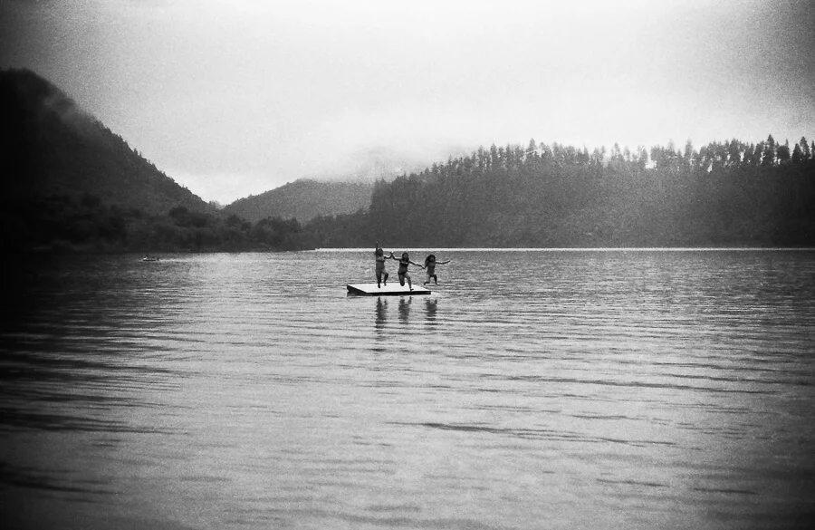 seeing a way back - girls jumping from a pontoon.jpg