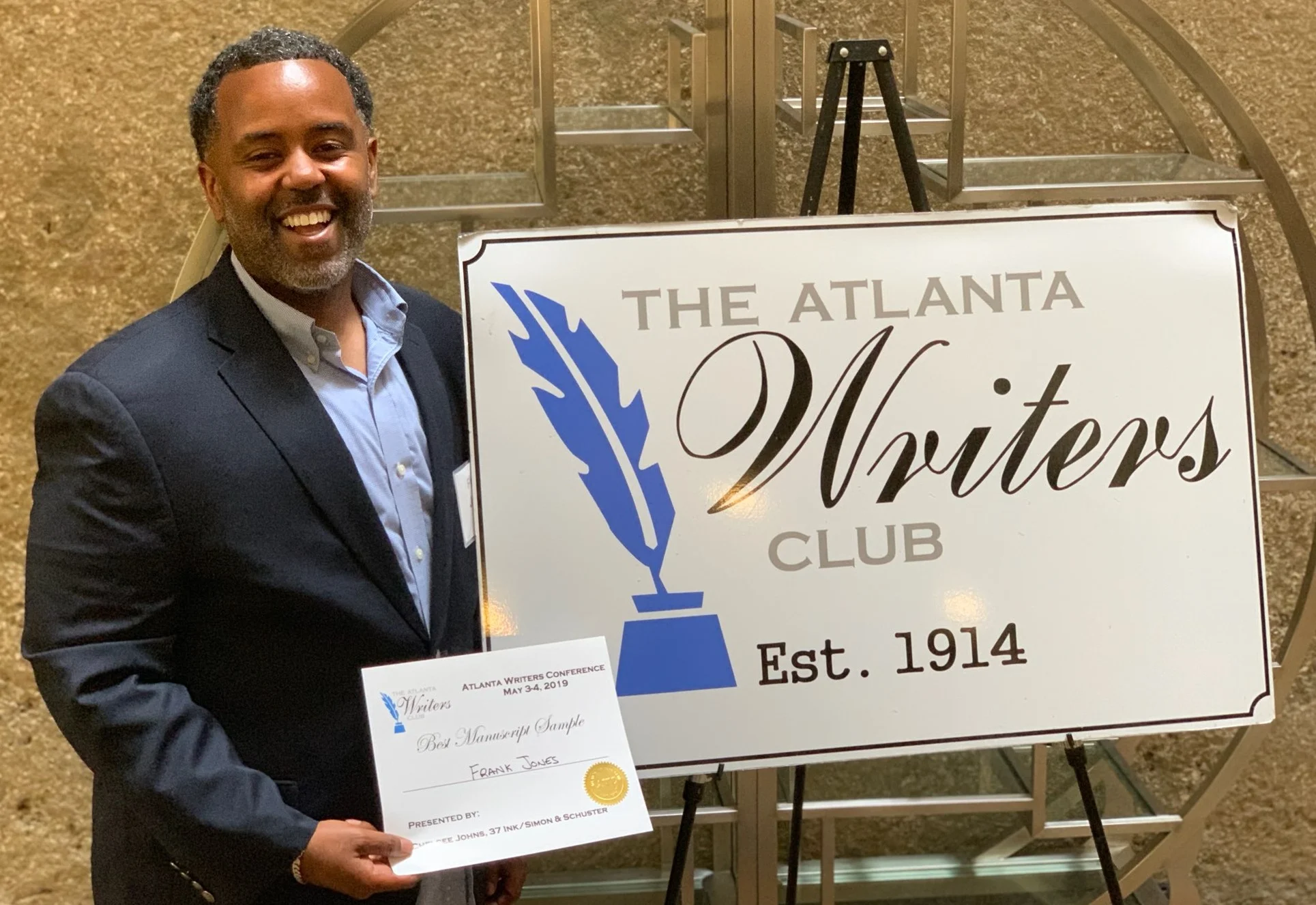 Francis after receiving his award at the May 2019 Atlanta Writers Club Conference