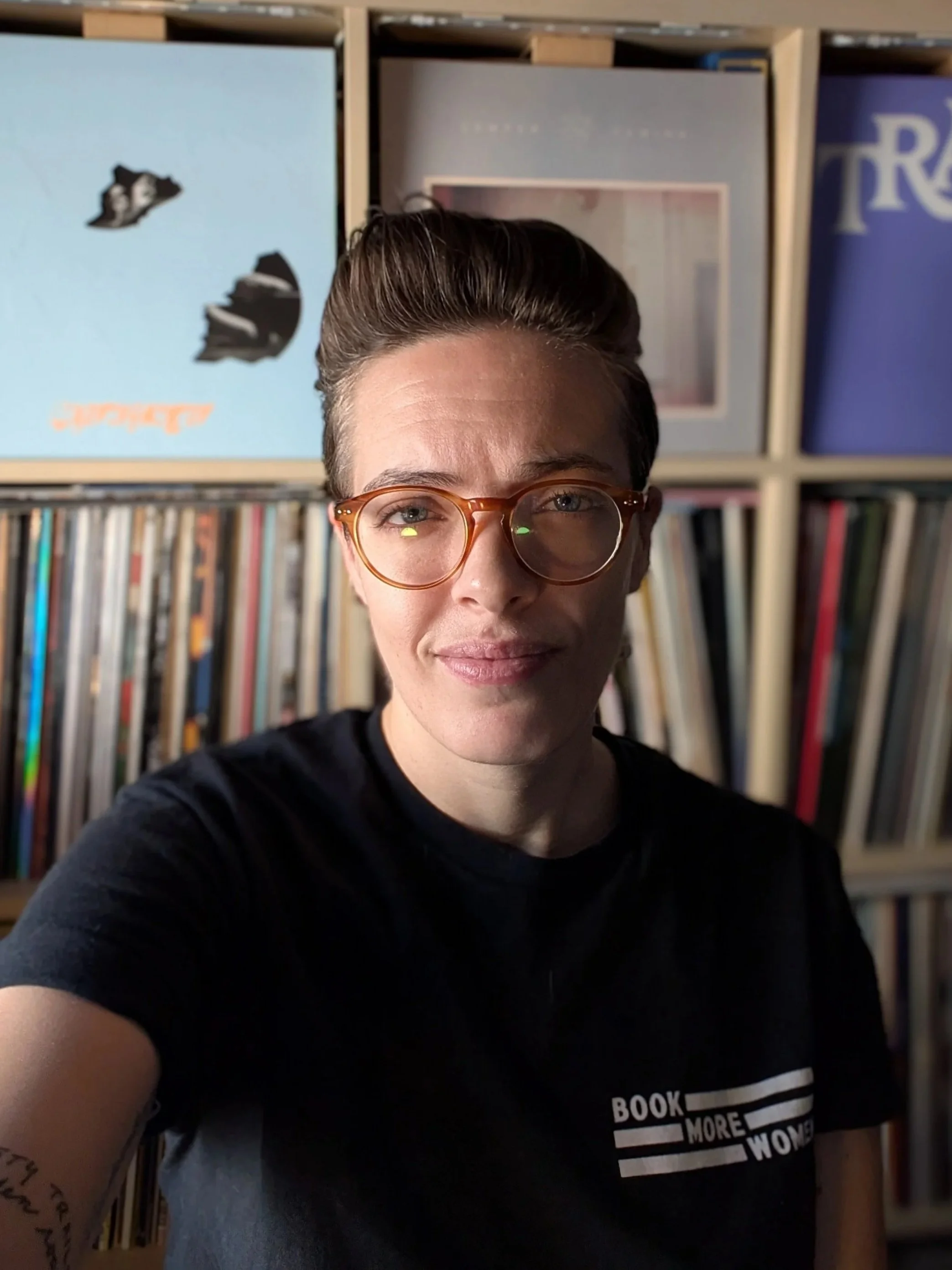 Abbey wearing Book More Women Logo T-shirt
