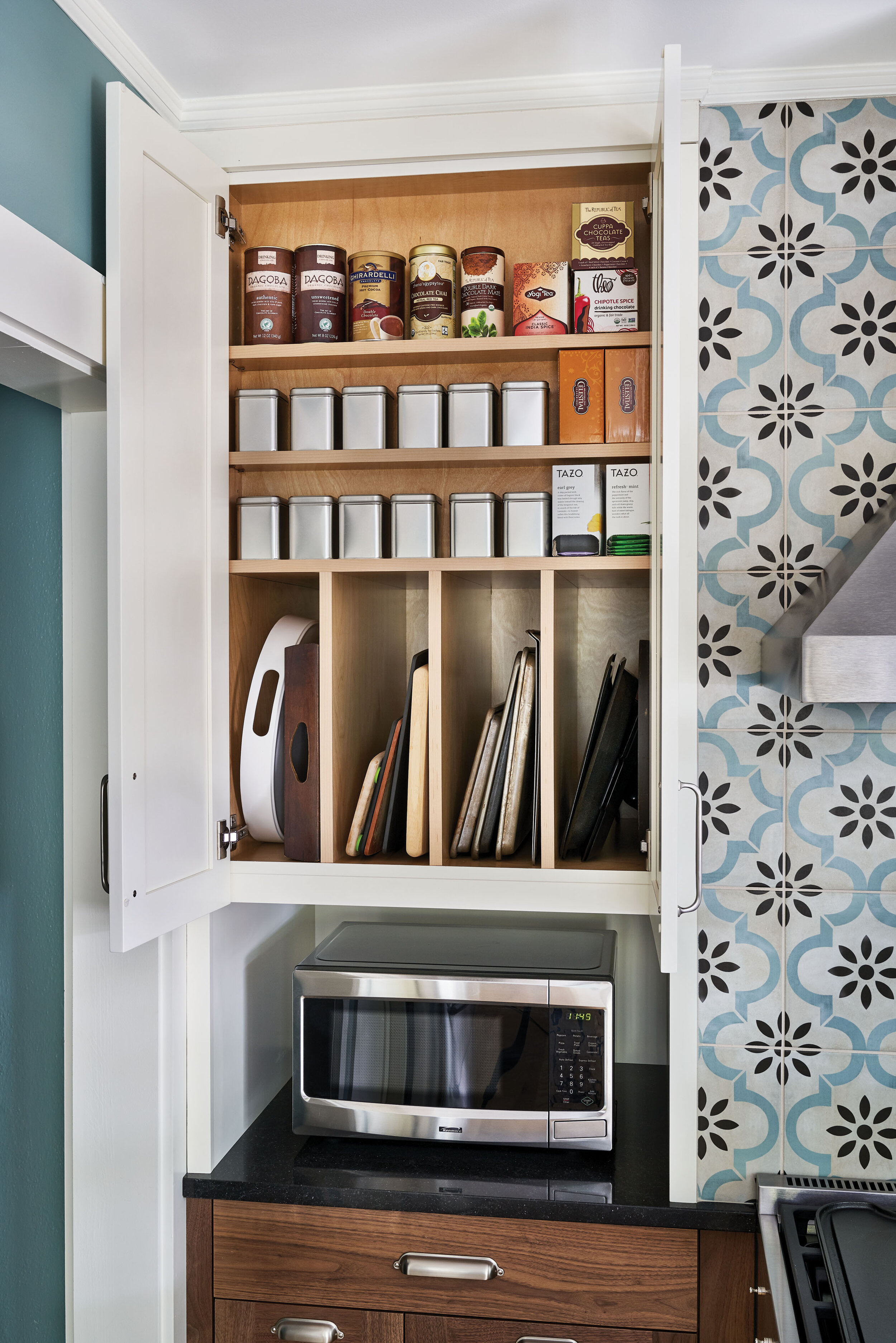 A shelf was created for the tea-loving clients to accommodate 2 different wall depths on the top and bottom.