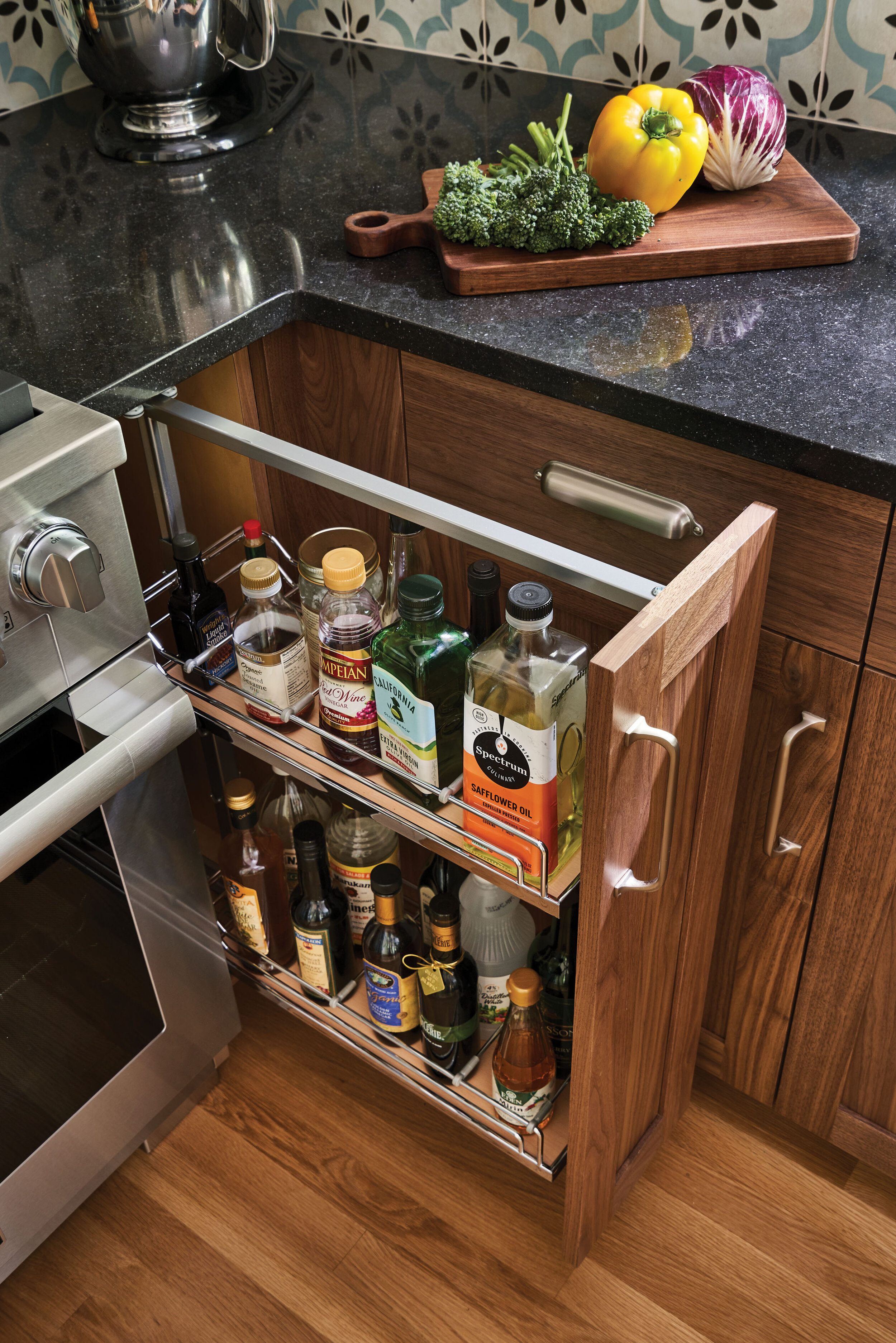 Innovative storage ideas add space to the tight kitchen corner space.