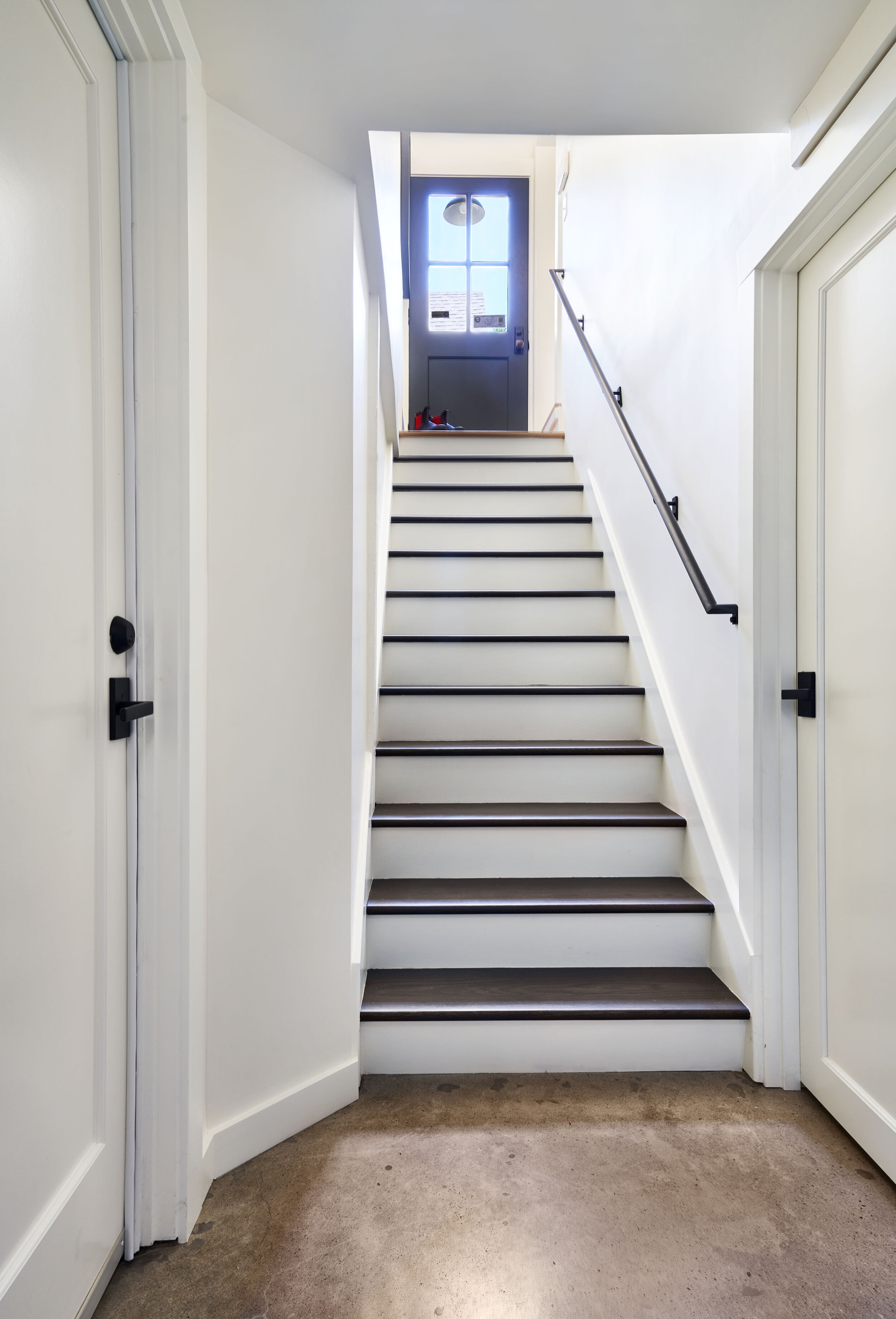 New and improved stair treads and risers connect seamlessly to the main part of the home.