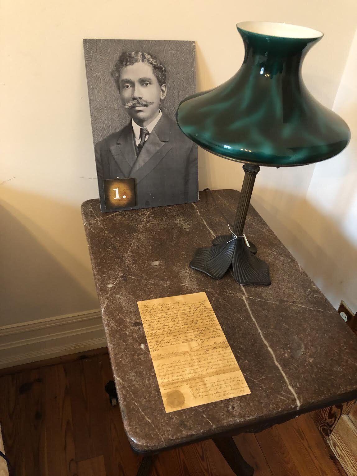 Dr. M. T. Pope, one of North Carolina’s first licensed African-American physicians. Also shown are his father’s freedom papers that he used to carry around.POpe HOuse museum, raleigh, north carolina