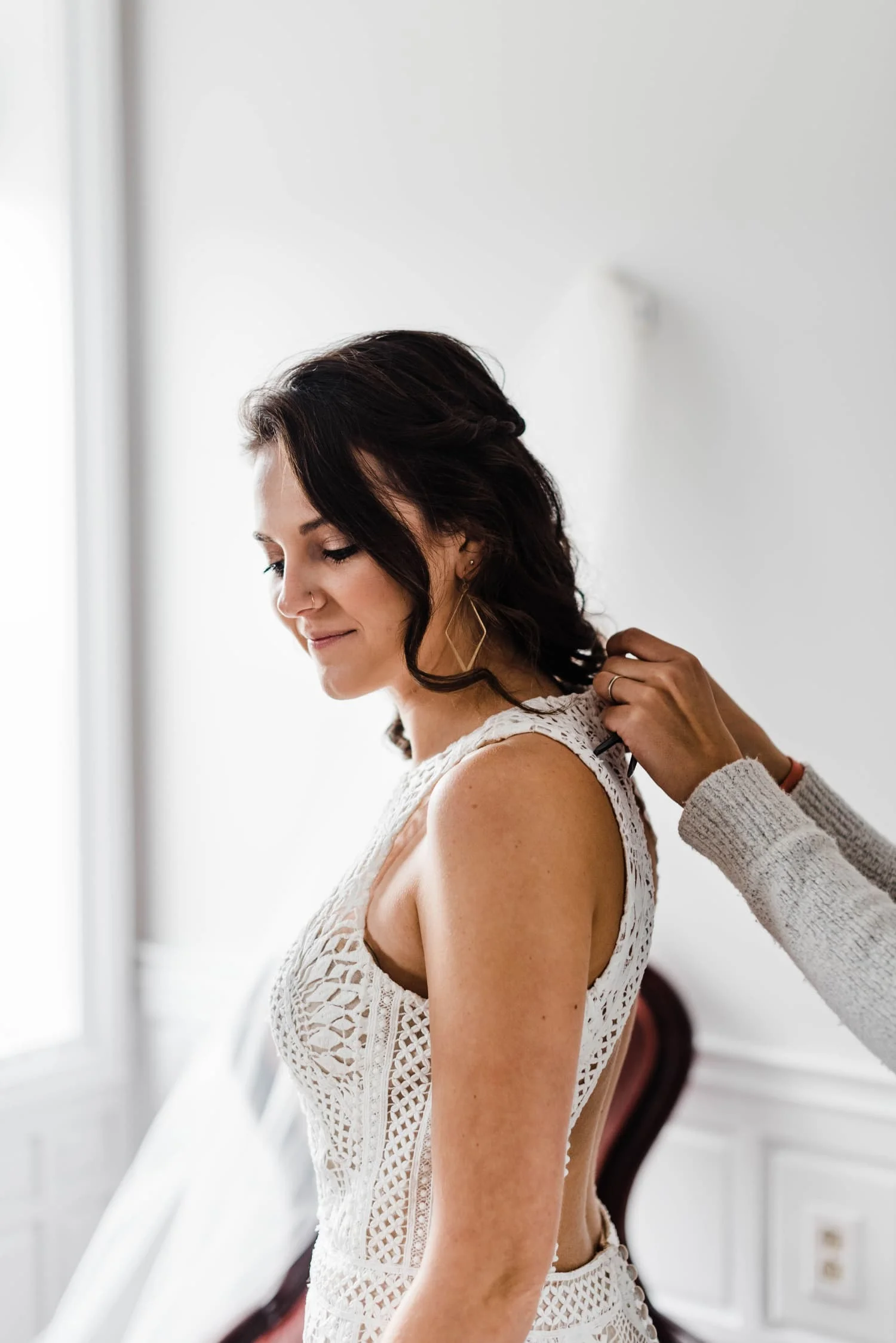 Bride having dress done up.jpg