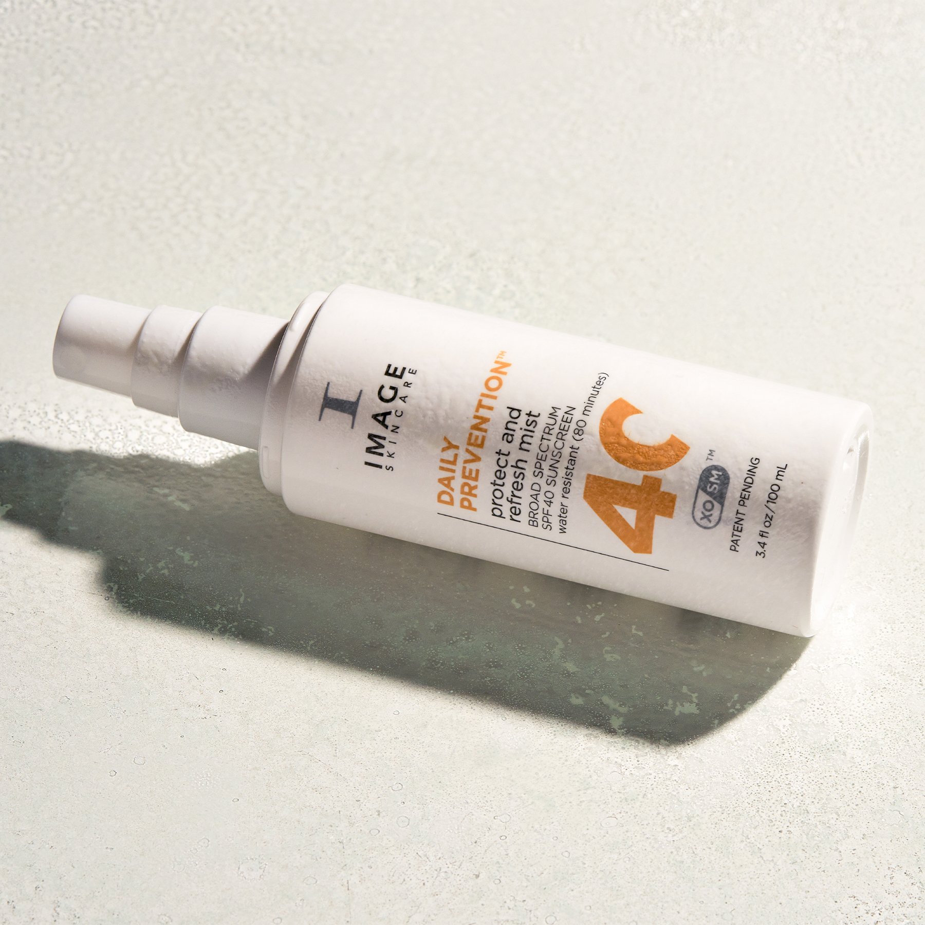 SPF 40 face mist hydrates with meadowfoam seed and buriti oils, offering clear, quick-absorbing UV protection and a healthy glow.