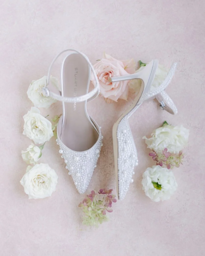 Walking through life with you, one step at a time! 👠🤍🥂 #justcalldana
&bull;
Photographer: @melanilustphotography
Venue: @roundhouseweddings
Dress: @karinshemesh_bridal
Florals: @kraftandcompany
Makeup Artist: @_giamakeup_
Hair Stylist: cassilvogue