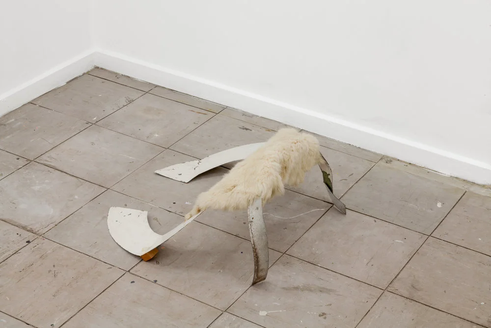 a crust of bread, 2015 steel, tape, rabbit fur