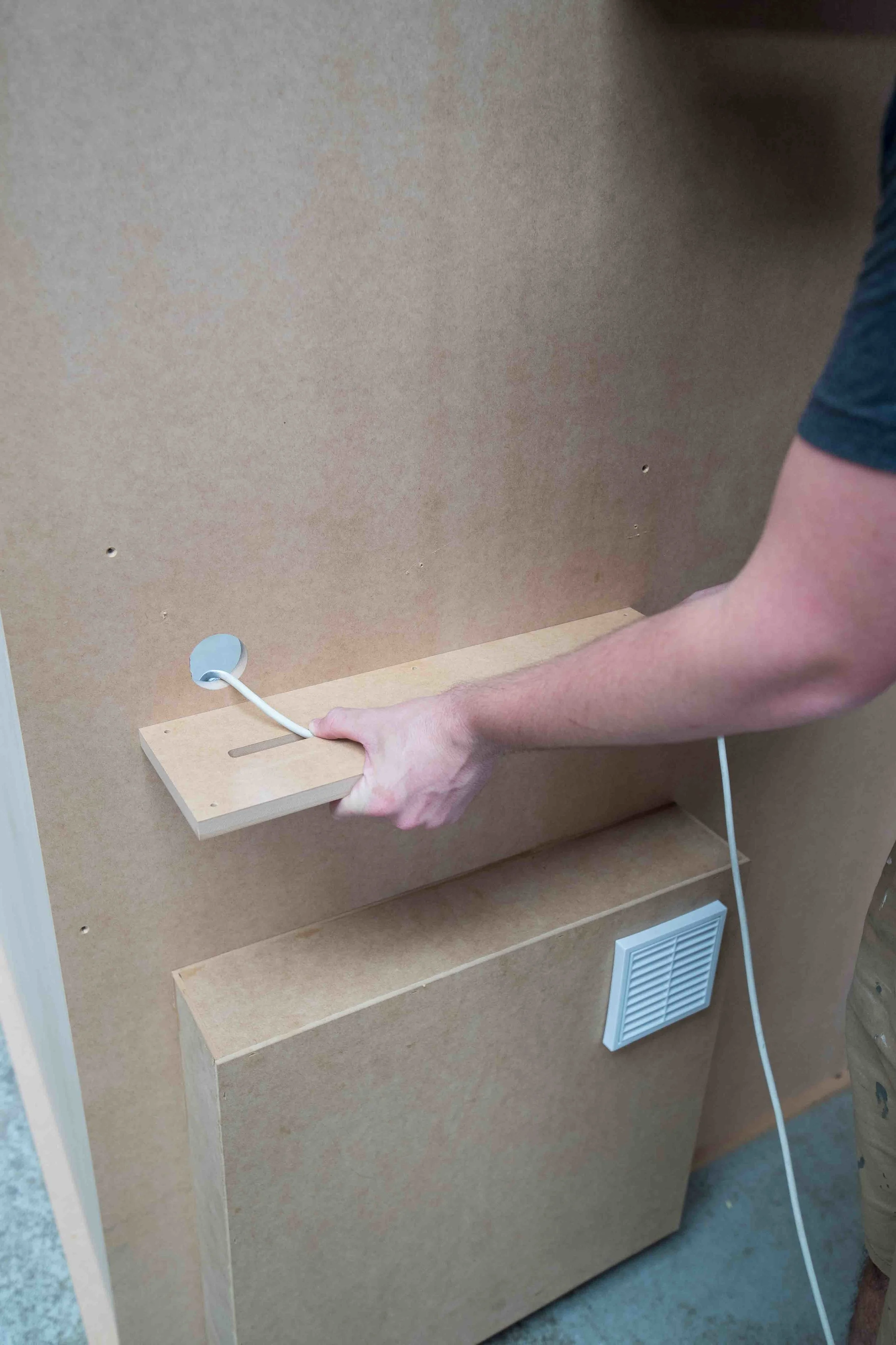 Step 14: Run the lead in the groove on the back of the plate