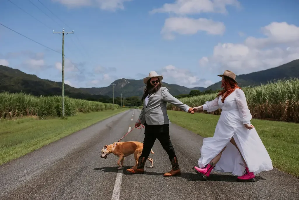 Couple who eloped in the cane fields outside Cairns with their dog with I Do Drive Thru — elopement celebrant from $400