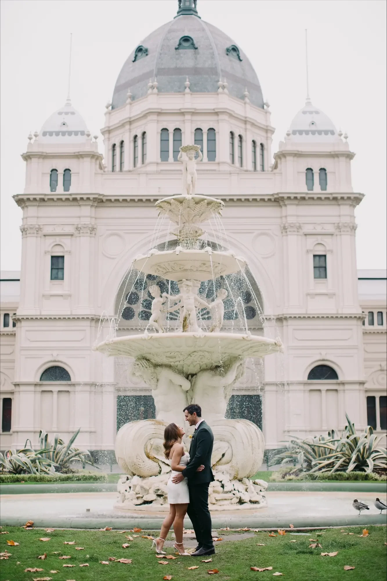Couple eloping at Carlton Gardens Melbourne with I Do Drive Thru — elopement celebrant from $400