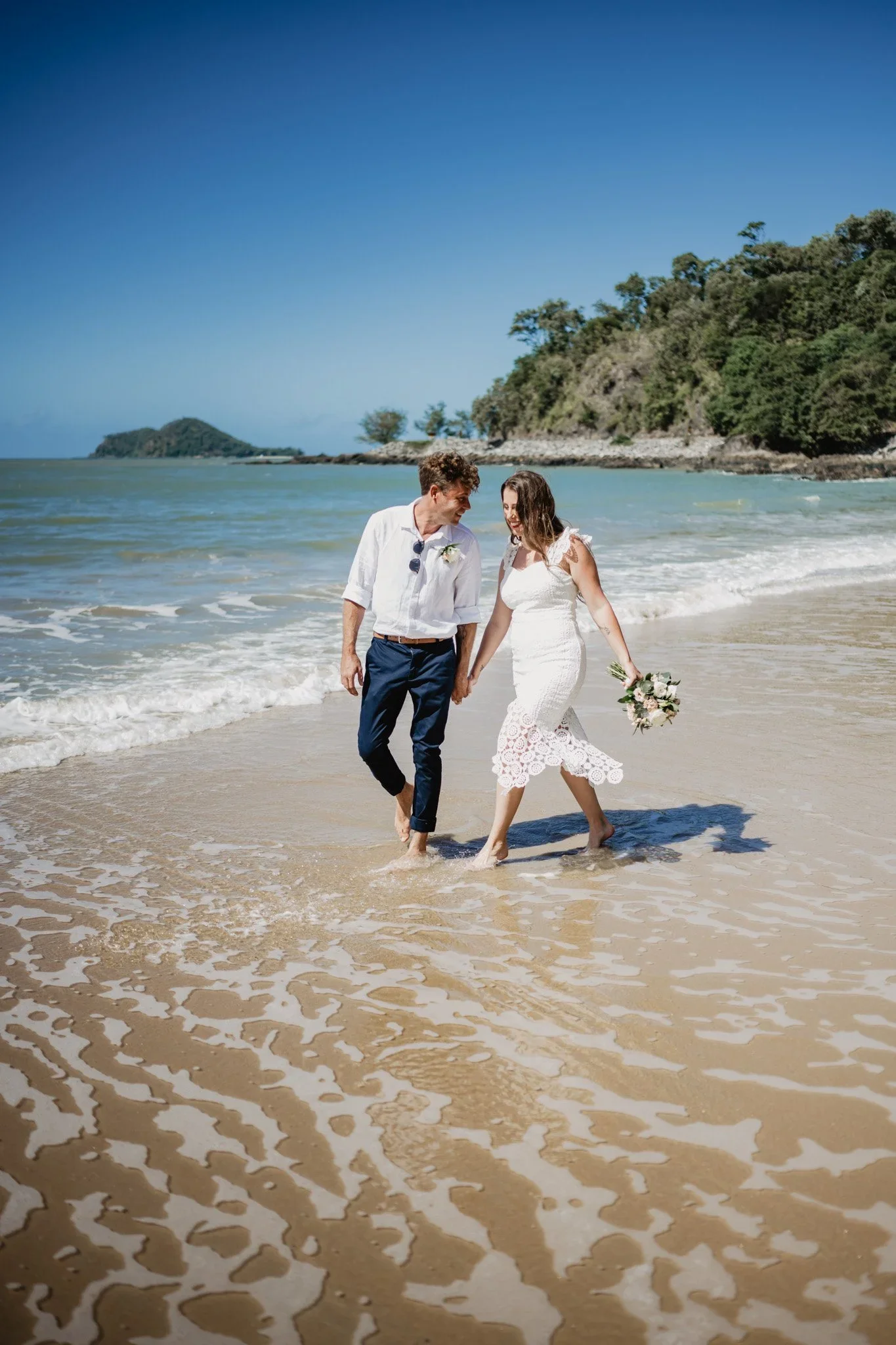 Couple eloping on the Gold Coast beach with I Do Drive Thru — elopement celebrant from $400