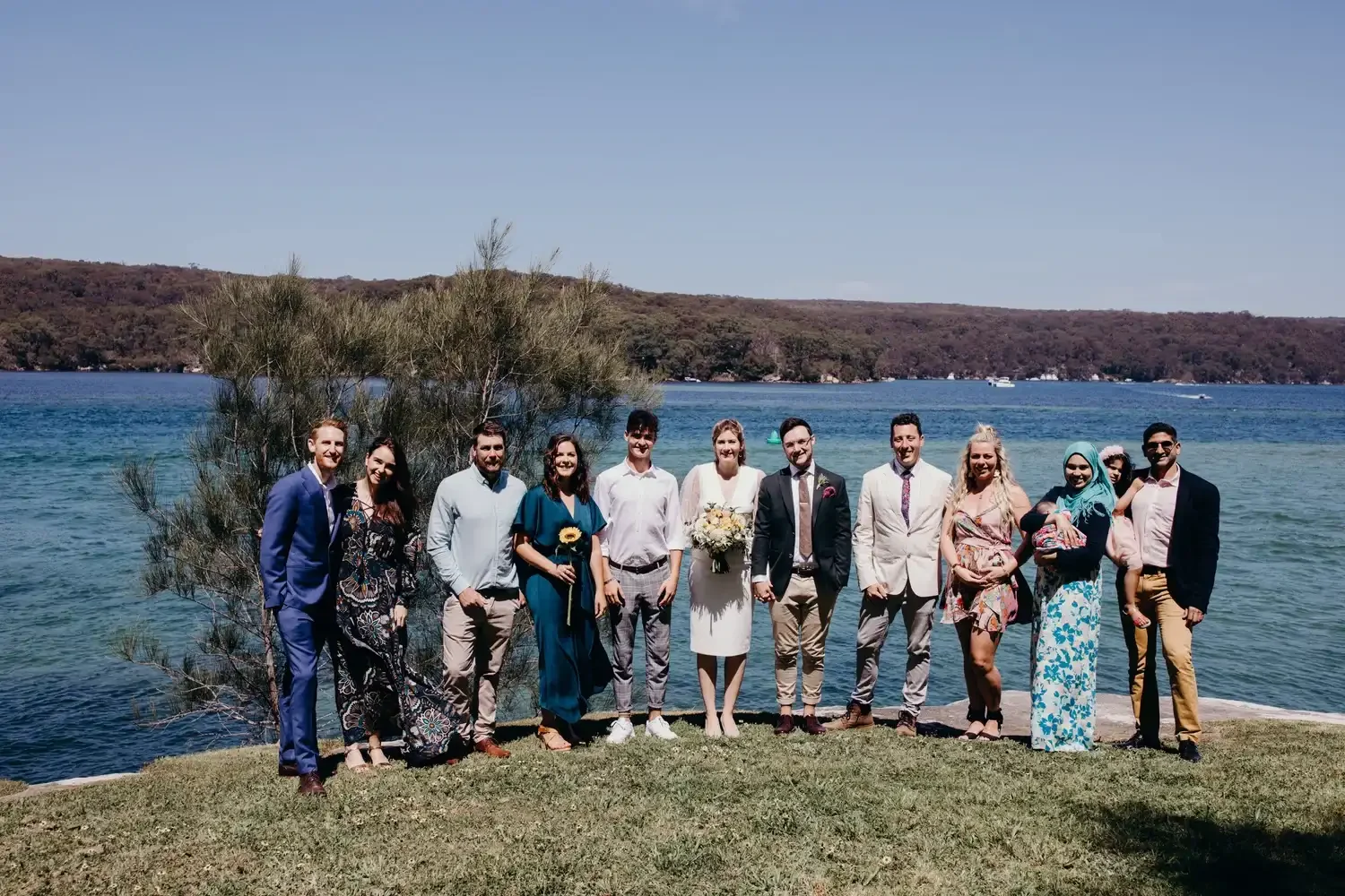 Couple having a small wedding on the clifftops at Northern Beaches Sydney with I Do Drive Thru — packages from $400