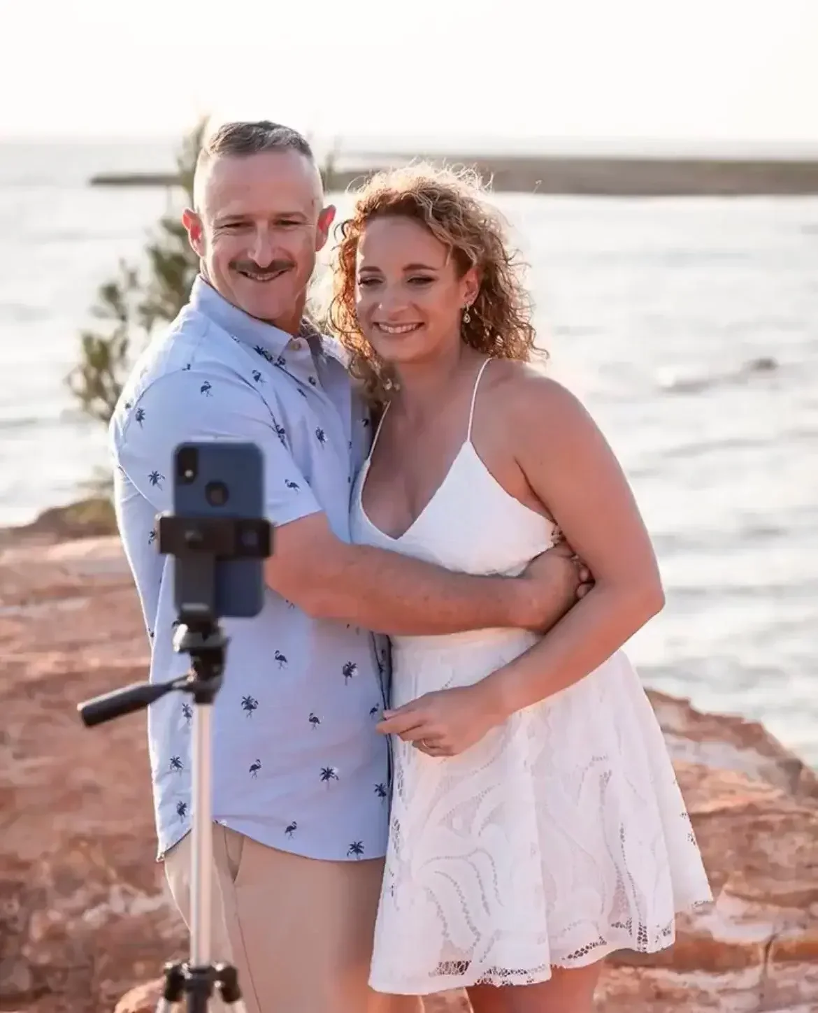 Bride with her daughter after eloping at a Darwin park with I Do Drive Thru — family elopement celebrant from $400