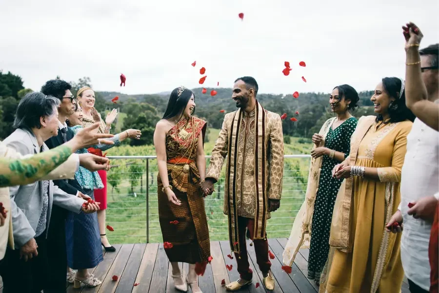 Couple celebrating their wedding at a Yarra Valley winery with confetti and I Do Drive Thru — Big Kahuna package from $800
