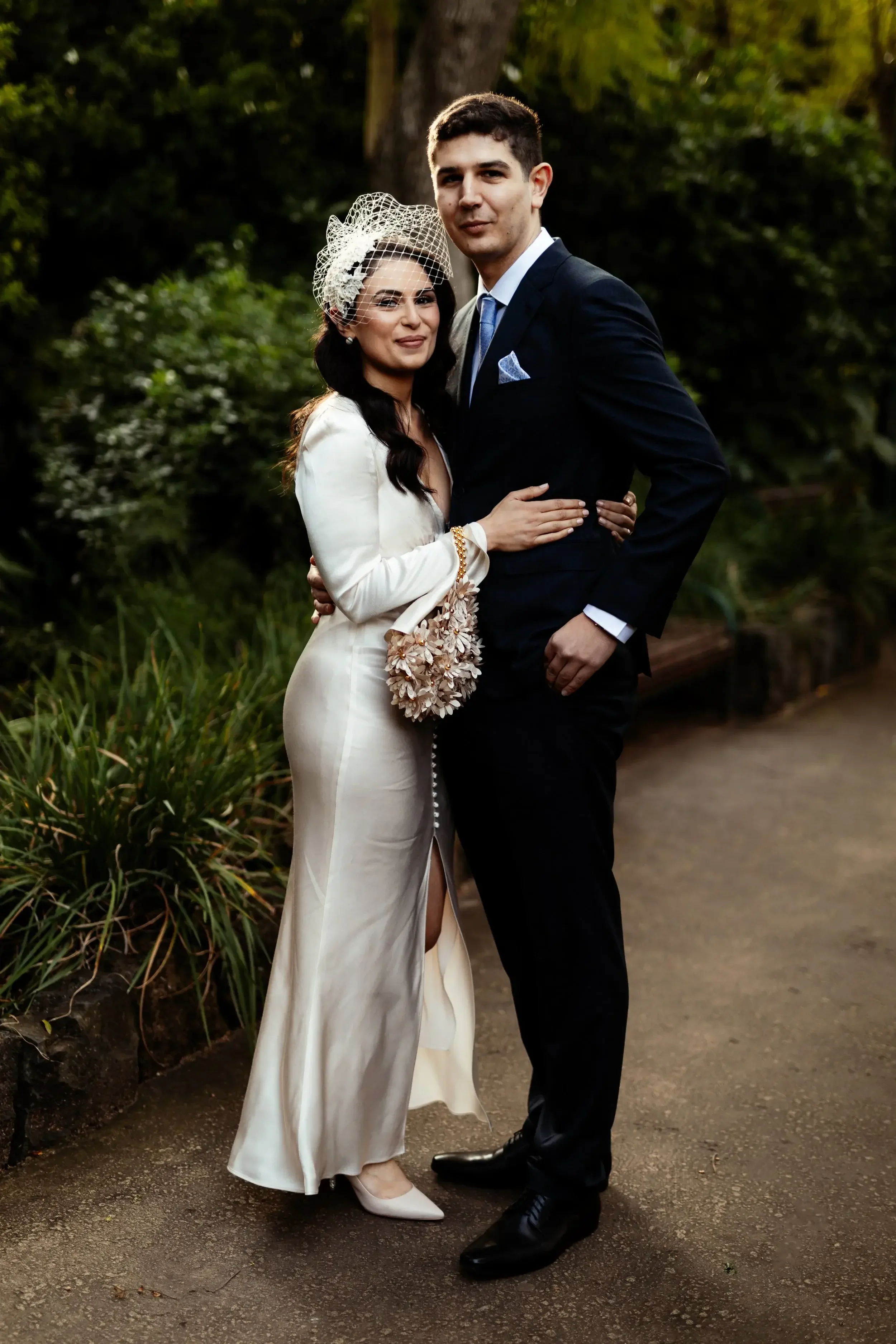 Elegant couple after eloping at Fitzroy Gardens Melbourne with I Do Drive Thru — heading out to celebrate