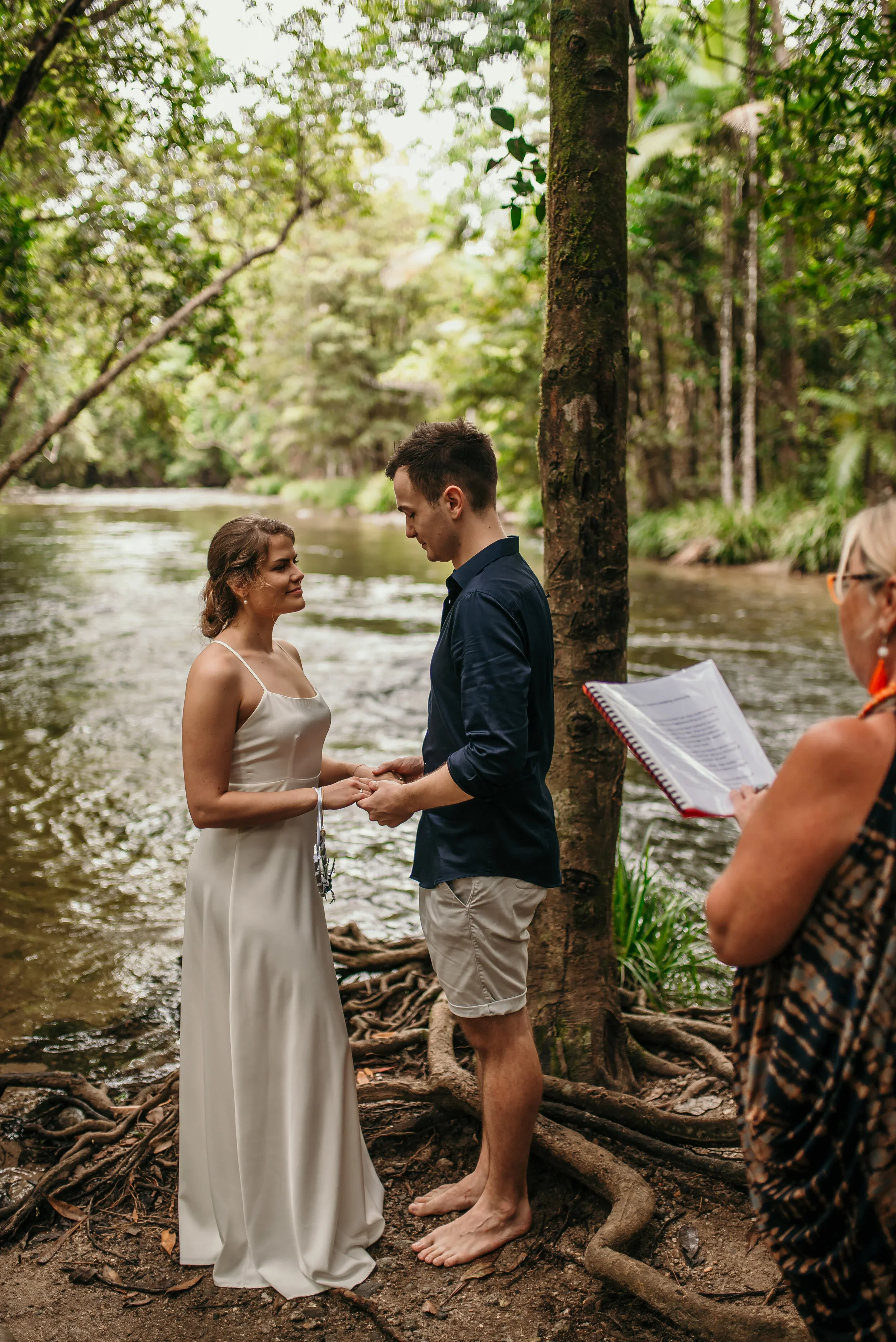 Couple celebrating after eloping in the Queensland rainforest with I Do Drive Thru — elopement packages from $400