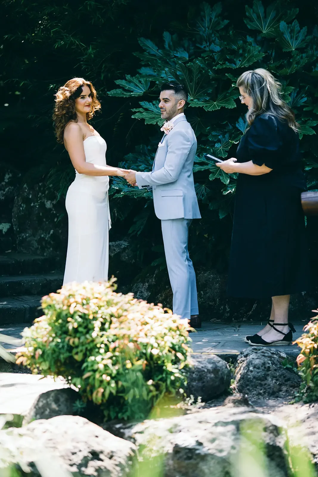 Couple eloping in the gardens of the Dandenong Ranges Victoria with I Do Drive Thru — elopement celebrant from $400
