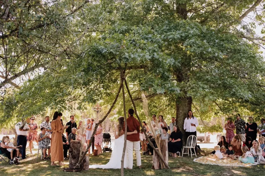 Big outdoor wedding ceremony under a tree in Geelong with I Do Drive Thru — wedding celebrant from $800