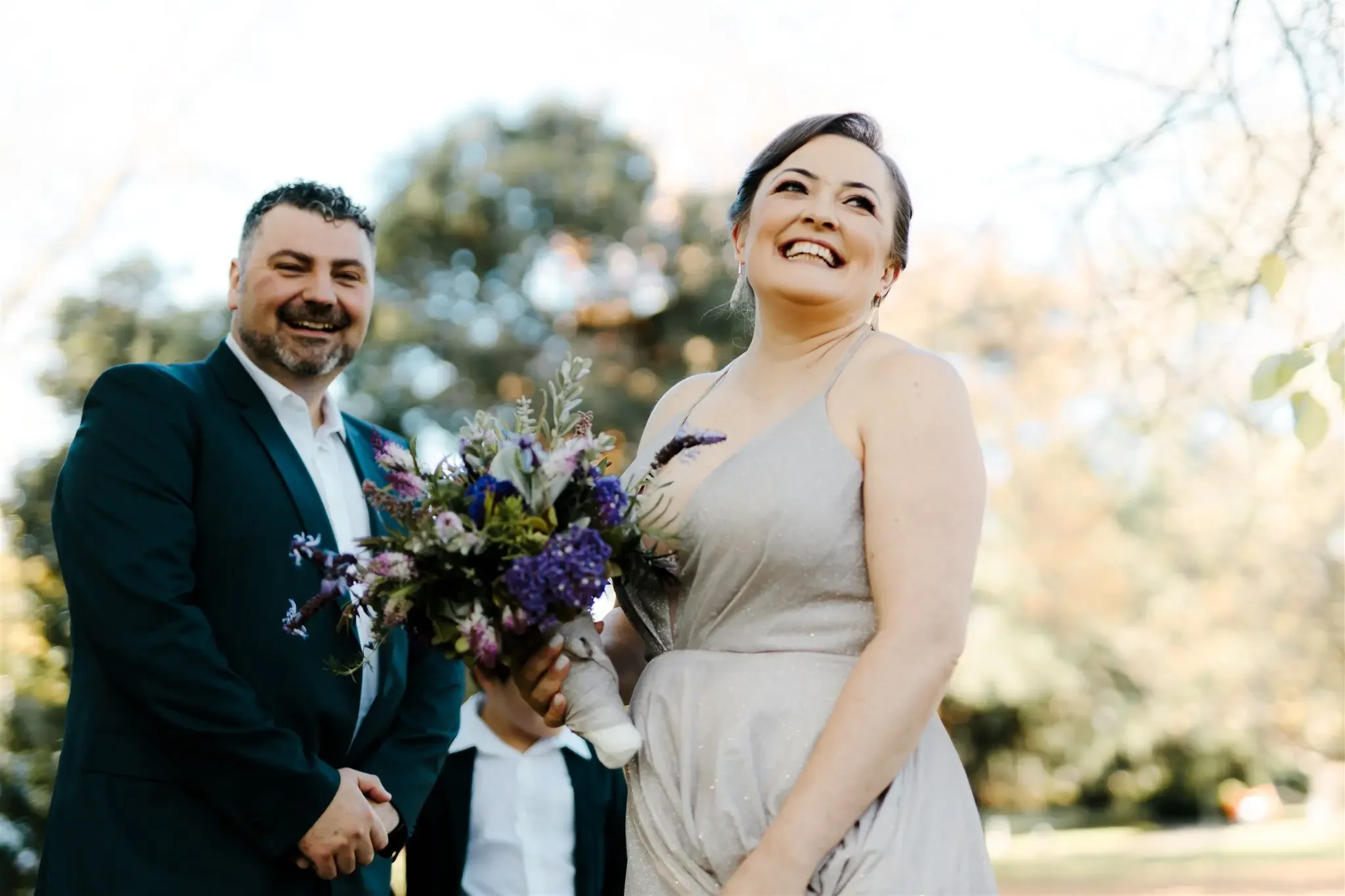 Couple who eloped at Alfred Nicholas Gardens in the Dandenong Ranges with their son and witnesses — I Do Drive Thru elopement celebrant from $400