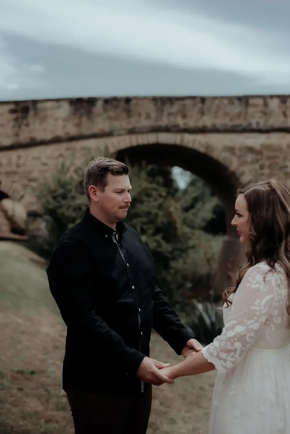 Couple eloping at Richmond Bridge Tasmania with I Do Drive Thru — elopement celebrant from $400