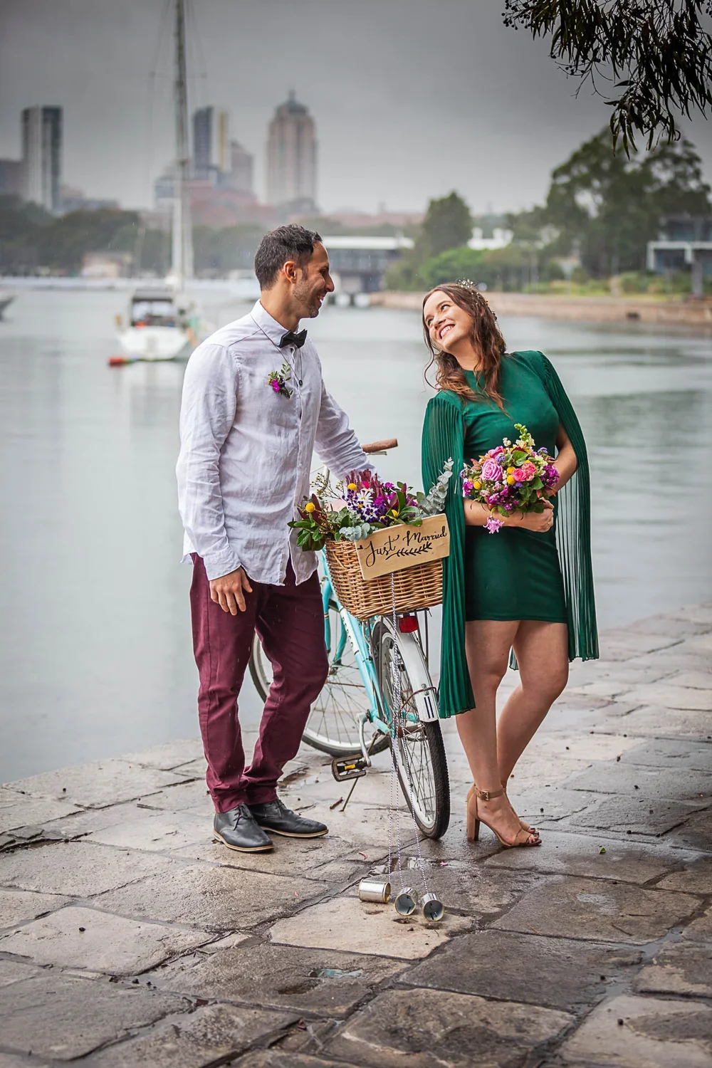 Uni students who just eloped at Melbourne Docklands with their bikes — I Do Drive Thru elopement celebrant from $400
