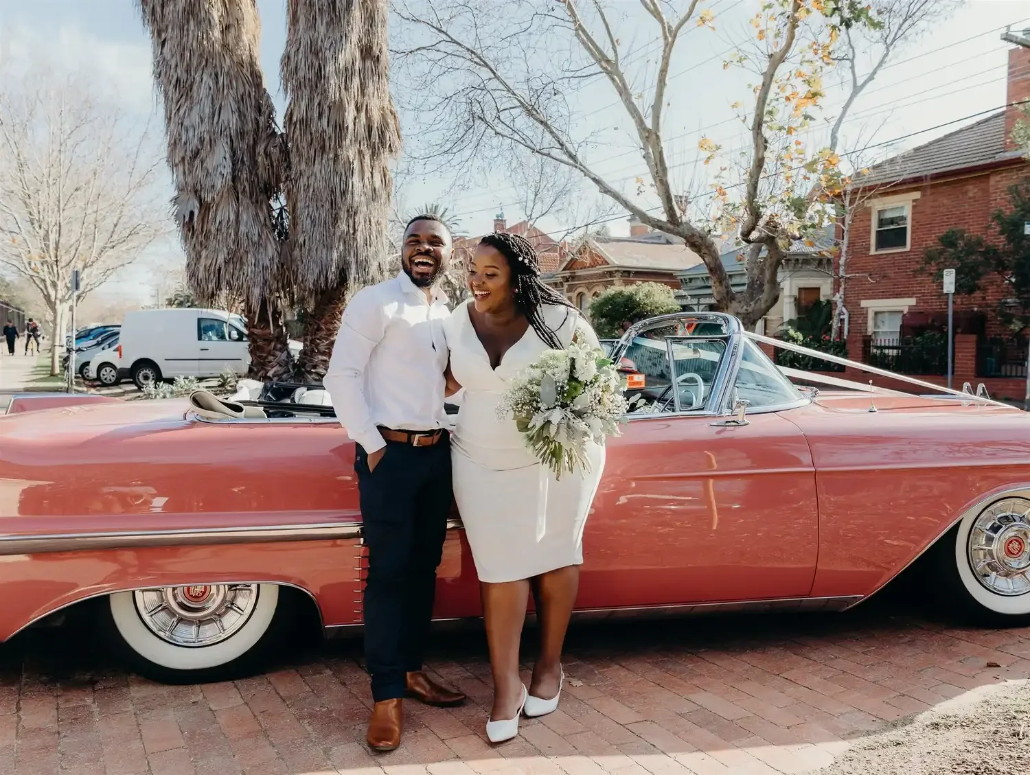 Couple eloping with a wedding car in St Kilda Melbourne with I Do Drive Thru — secret elopement from $400