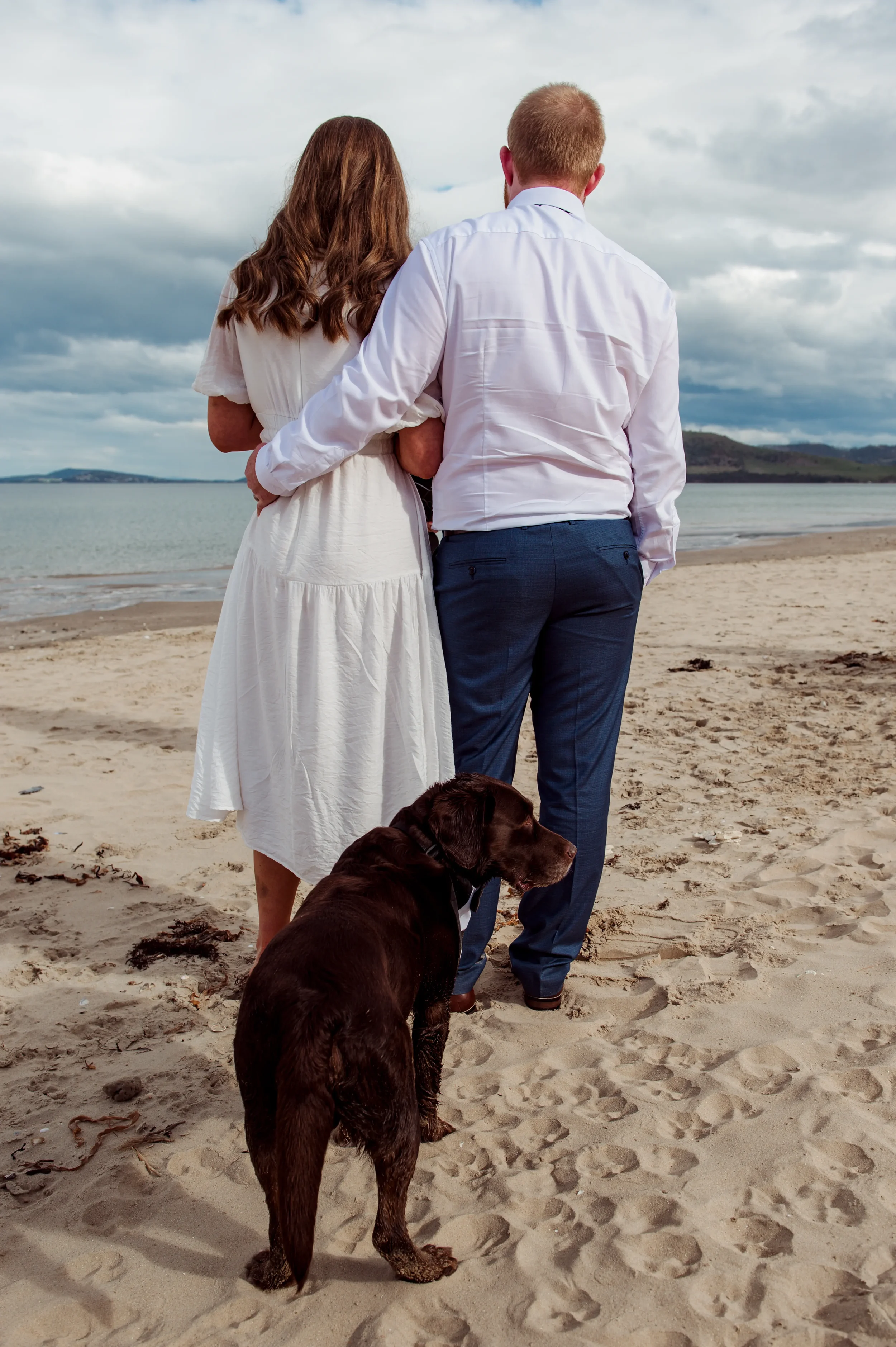 Same sex male couplCouple after eloping with Dog for I Do Drive Thru — LGBTQ+ elopement celebrant from $400