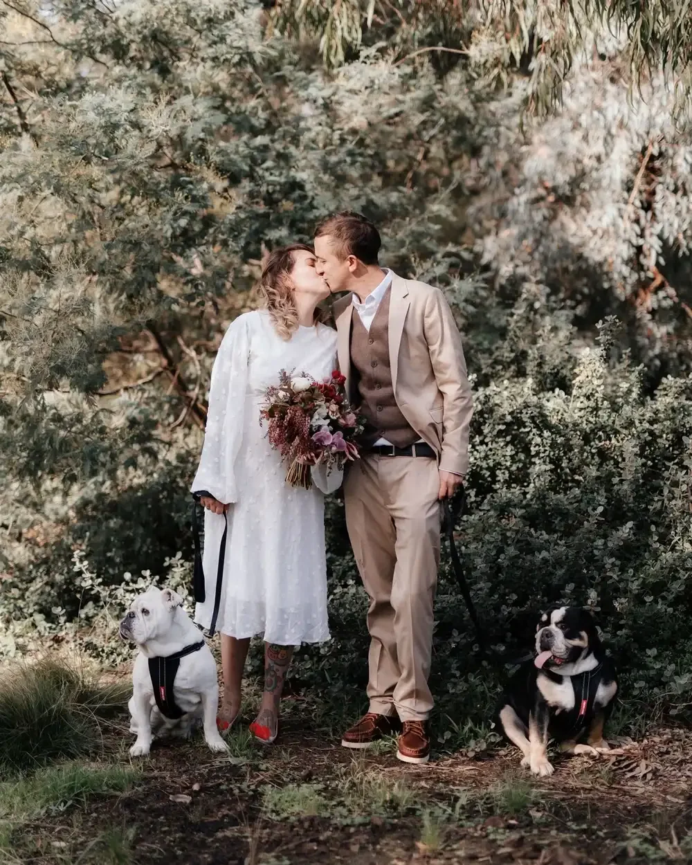Couple eloping at Merri Creek Northcote Melbourne with their dogs with I Do Drive Thru — park elopement celebrant from $400