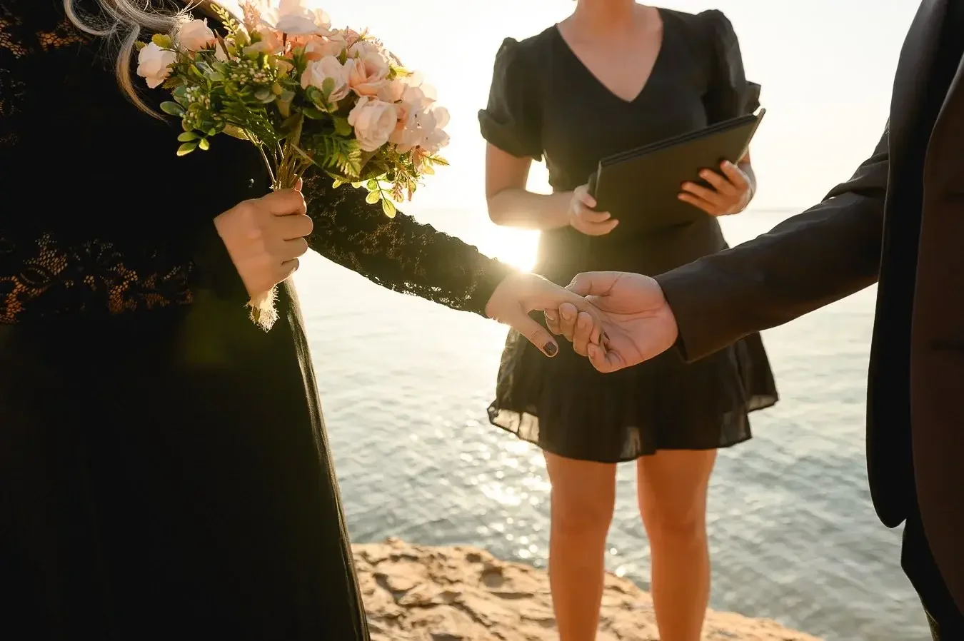 Couple eloping on a Darwin beach at sunset with I Do Drive Thru — beach elopement celebrant from $400