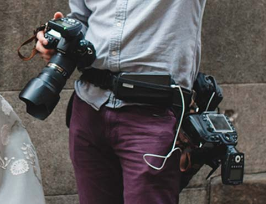 SpiderPro harnesses are waist belts that can hold up to two cameras and accessories. Cameras snap in and out of them, which is so helpful and quick! Prices and features range: $150-265.